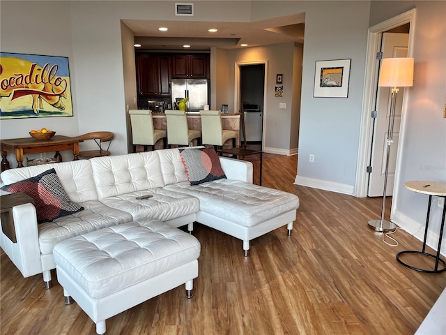 1209 E Cumberland Ave Unit 508, Tampa, FL 33602 - living area with baseboards, light wood-type flooring, and recessed lighting
