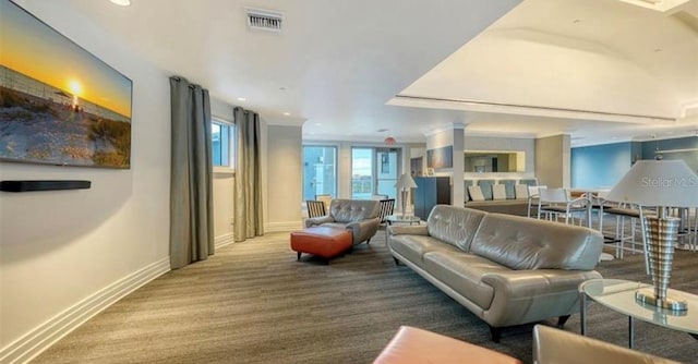 1209 E Cumberland Ave Unit 508, Tampa, FL 33602 - living room featuring carpet, baseboards, and recessed lighting