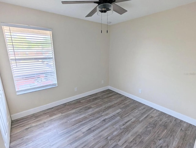 unfurnished room featuring ceiling fan and light hardwood / wood-style flooring