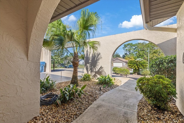 view of patio featuring a garage