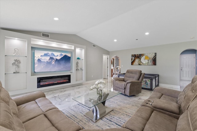 living room with vaulted ceiling