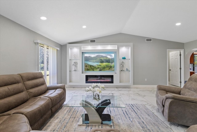 living room with vaulted ceiling