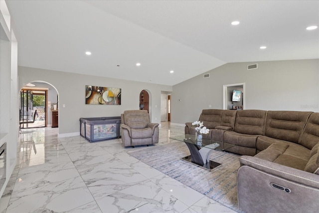 living room with vaulted ceiling