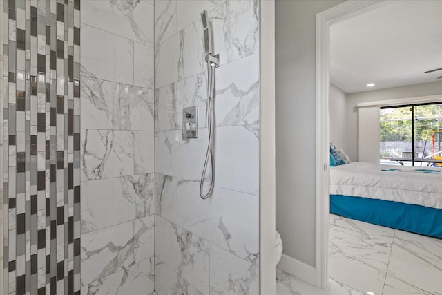 bathroom featuring a tile shower