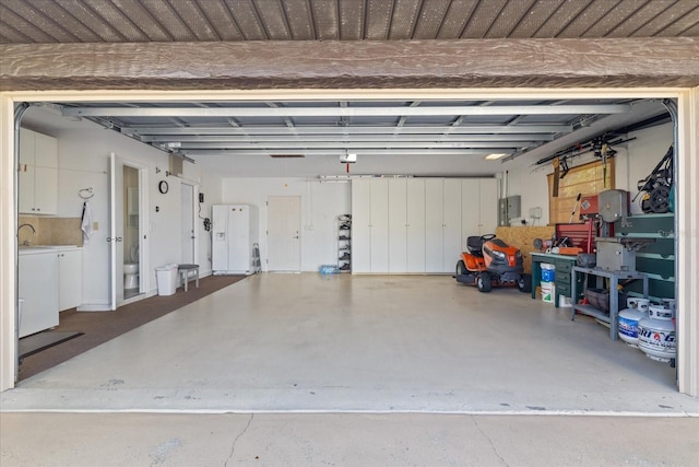 garage featuring washer and clothes dryer