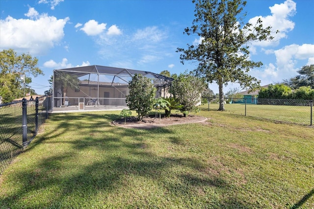 view of yard with a lanai