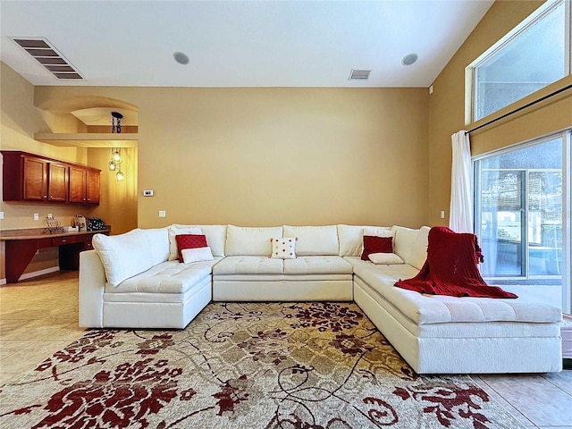 living room featuring light tile patterned flooring