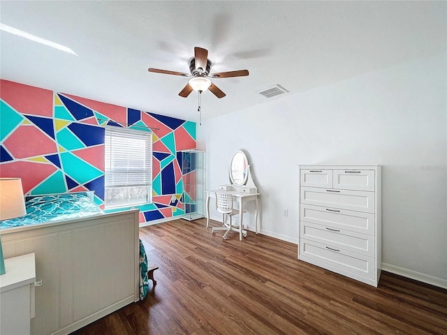 interior space with dark wood-type flooring and ceiling fan