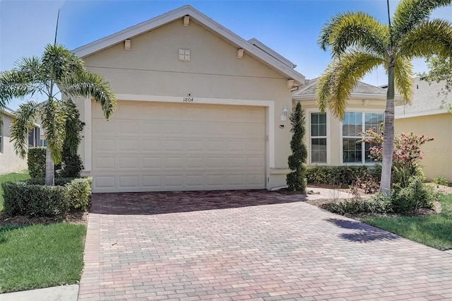 ranch-style home with a garage