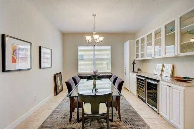 dining space with wine cooler, an inviting chandelier, and light tile patterned floors