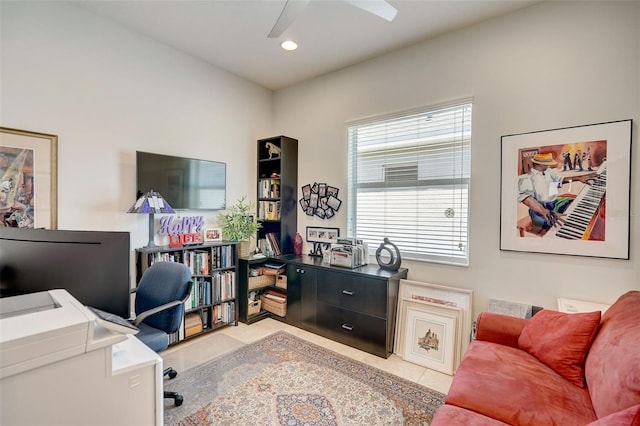 tiled office space with ceiling fan