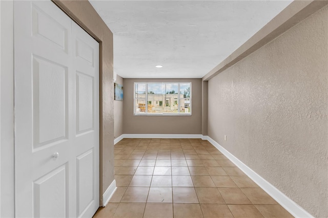 view of tiled spare room