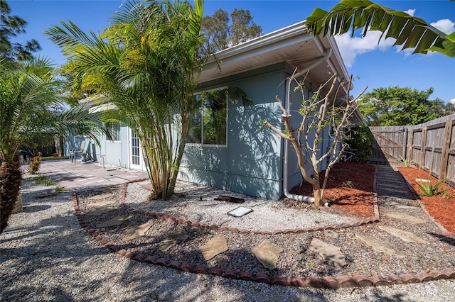 view of home's exterior with a patio area