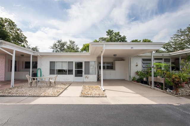 view of front of house featuring a carport