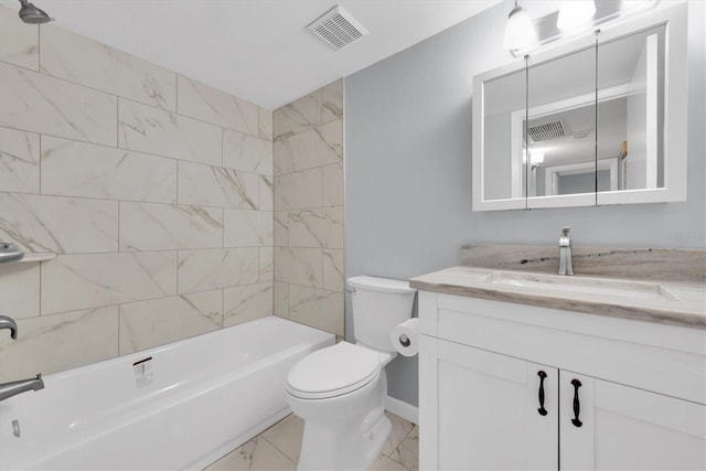 full bathroom with vanity, toilet, and tiled shower / bath combo