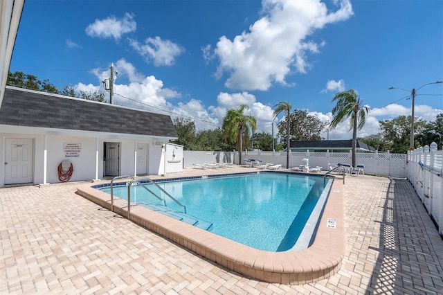 view of swimming pool featuring a patio