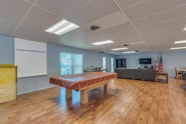 recreation room featuring a paneled ceiling, hardwood / wood-style flooring, and billiards