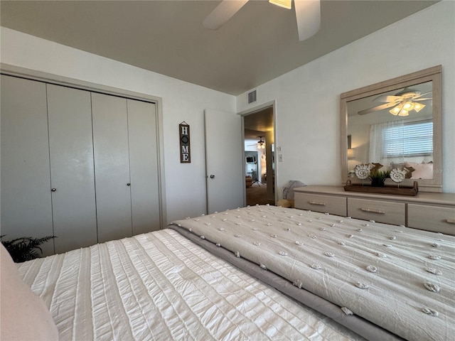 bedroom with a closet and ceiling fan