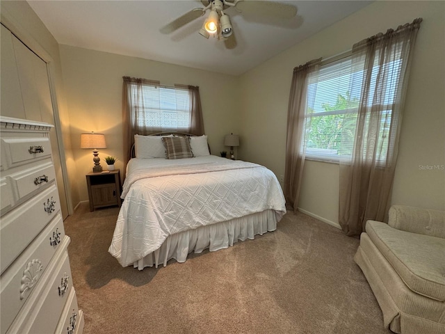 bedroom featuring carpet and ceiling fan