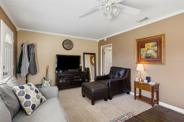 living room with crown molding, carpet floors, and ceiling fan