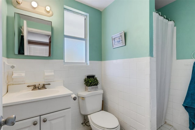 bathroom featuring plenty of natural light, toilet, and tile walls