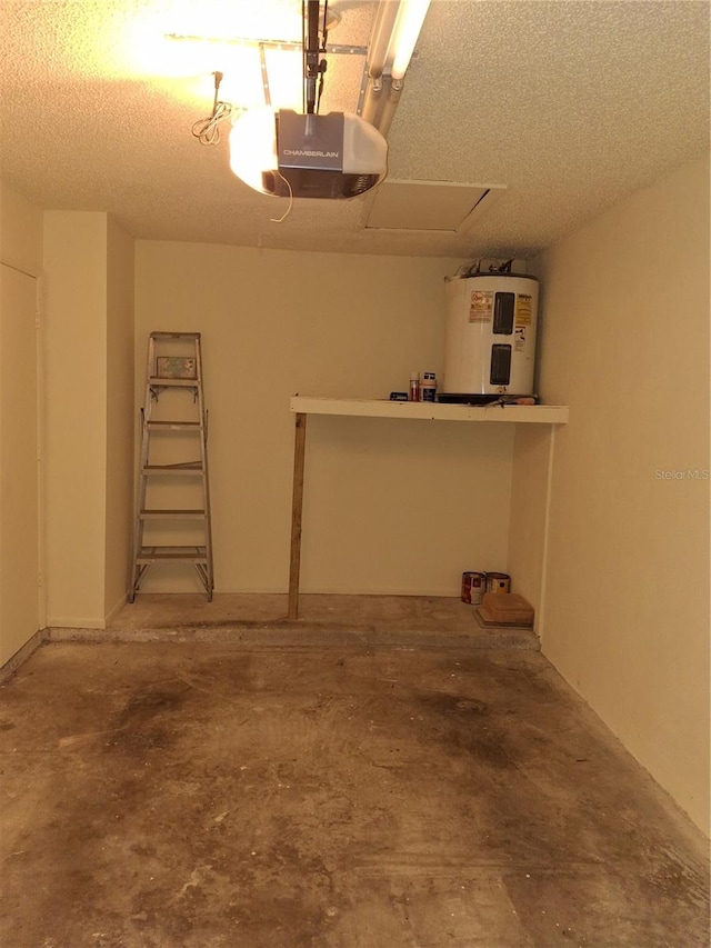 garage featuring a garage door opener and electric water heater