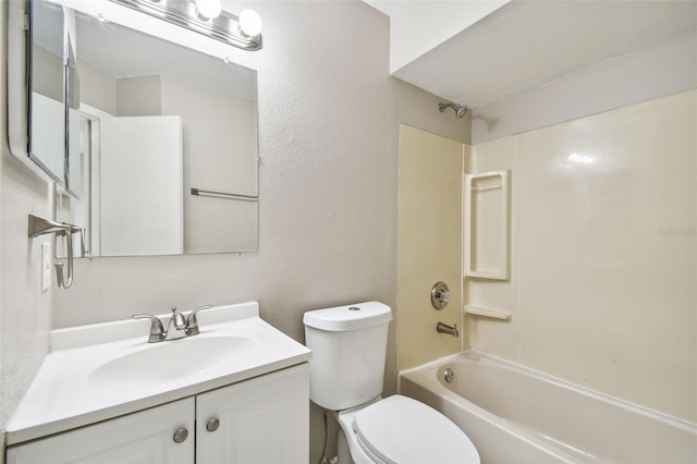 full bathroom featuring vanity, toilet, and shower / bathtub combination