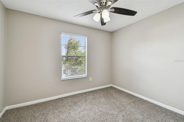 unfurnished room featuring ceiling fan, a textured ceiling, and carpet floors