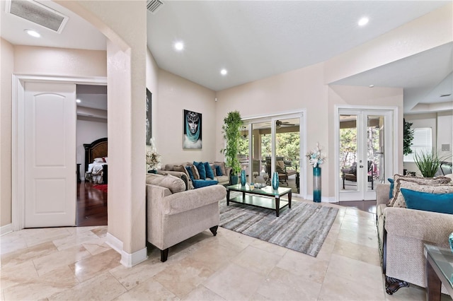 living room featuring light hardwood / wood-style flooring and french doors