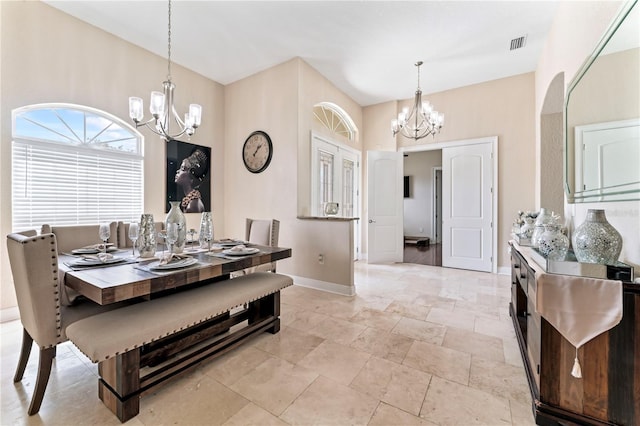 dining room featuring a chandelier