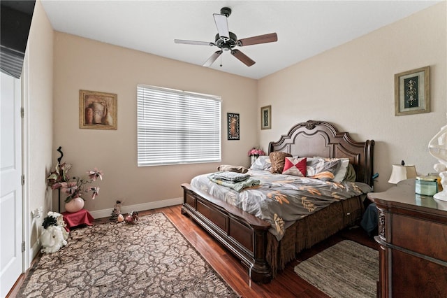 bedroom with hardwood / wood-style flooring and ceiling fan