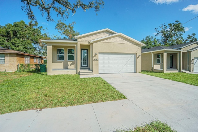 ranch-style home with a garage and a front lawn