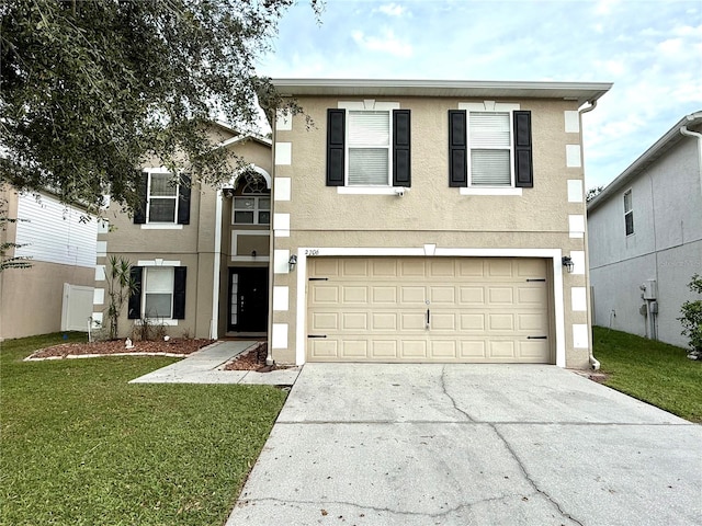 view of front property featuring a front yard and a garage