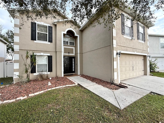 view of front of property with a garage