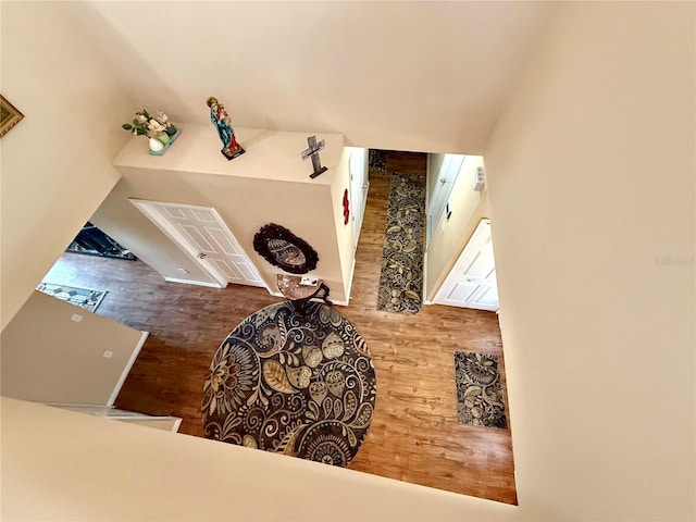 staircase featuring hardwood / wood-style flooring