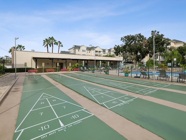 view of property's community with a pool