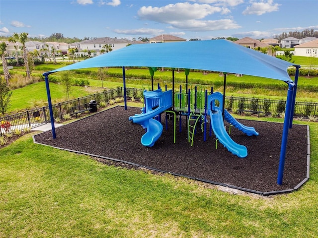 view of playground with a yard