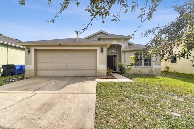 view of front of property with a front yard and a garage