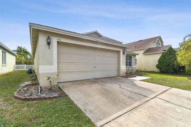 single story home featuring a garage and a front lawn