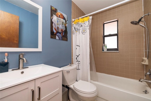 full bathroom with vanity, toilet, and shower / bath combo with shower curtain