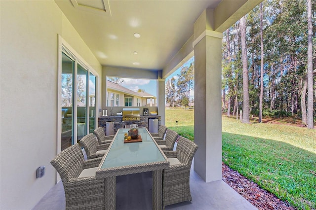 view of patio / terrace with an outdoor kitchen and area for grilling