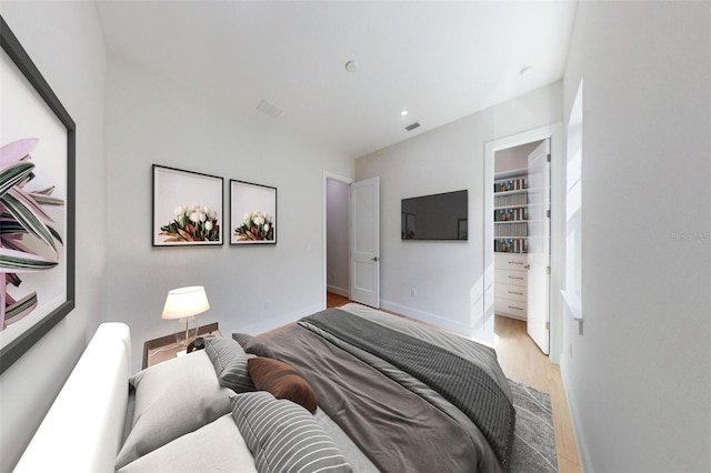 bedroom with light wood-type flooring