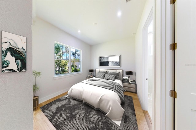 bedroom with light hardwood / wood-style flooring