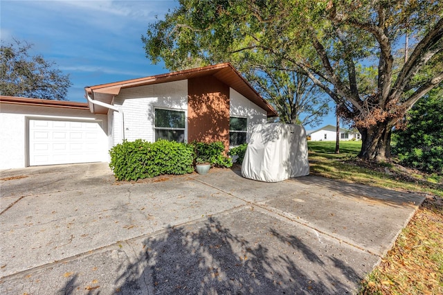 exterior space with a garage