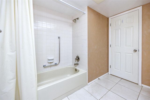 bathroom featuring tile patterned floors and shower / tub combo