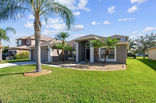 view of front facade with a garage and a front lawn