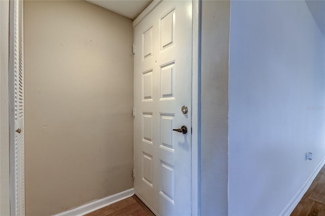 doorway featuring dark wood-type flooring