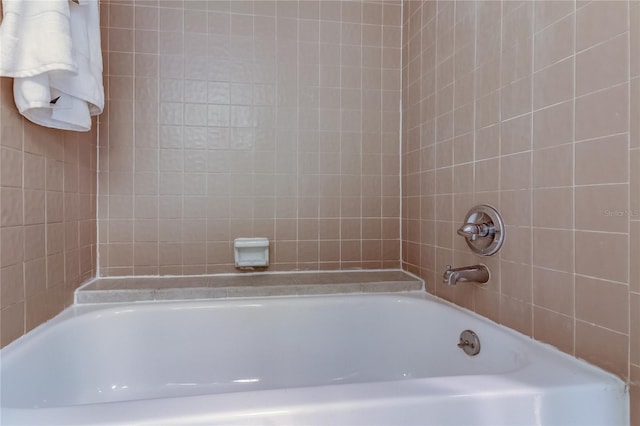 bathroom featuring a tub