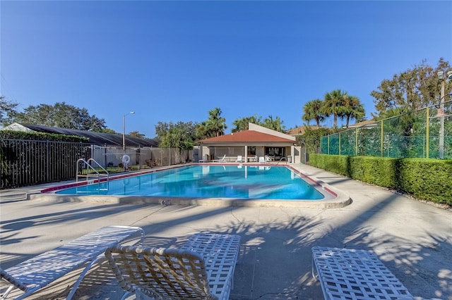 view of pool with a patio area