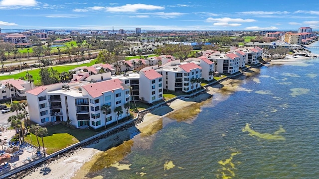 drone / aerial view with a water view